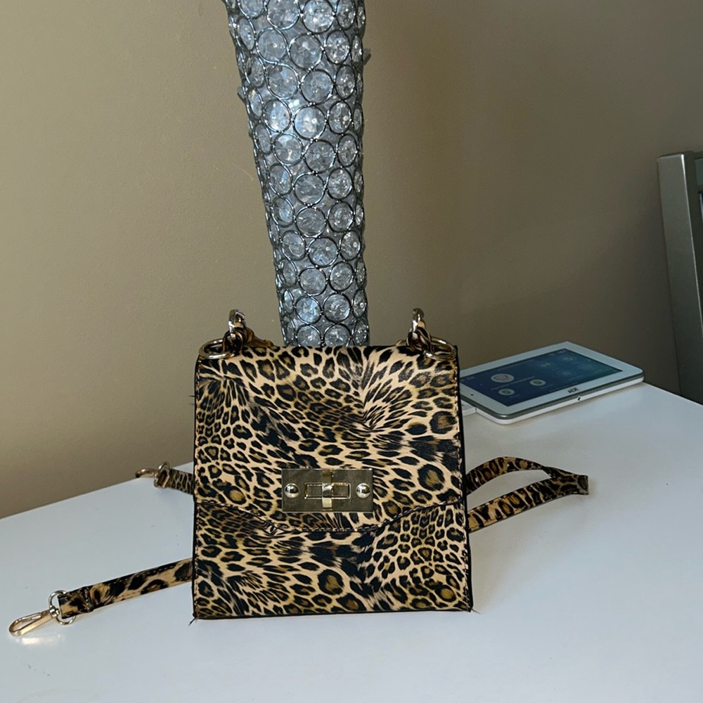 Express animal print cross body with bamboo handle